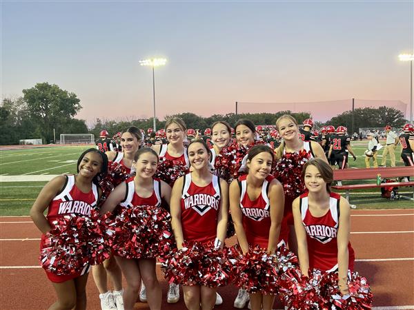 Cheerleaders at the first home football game of 2022